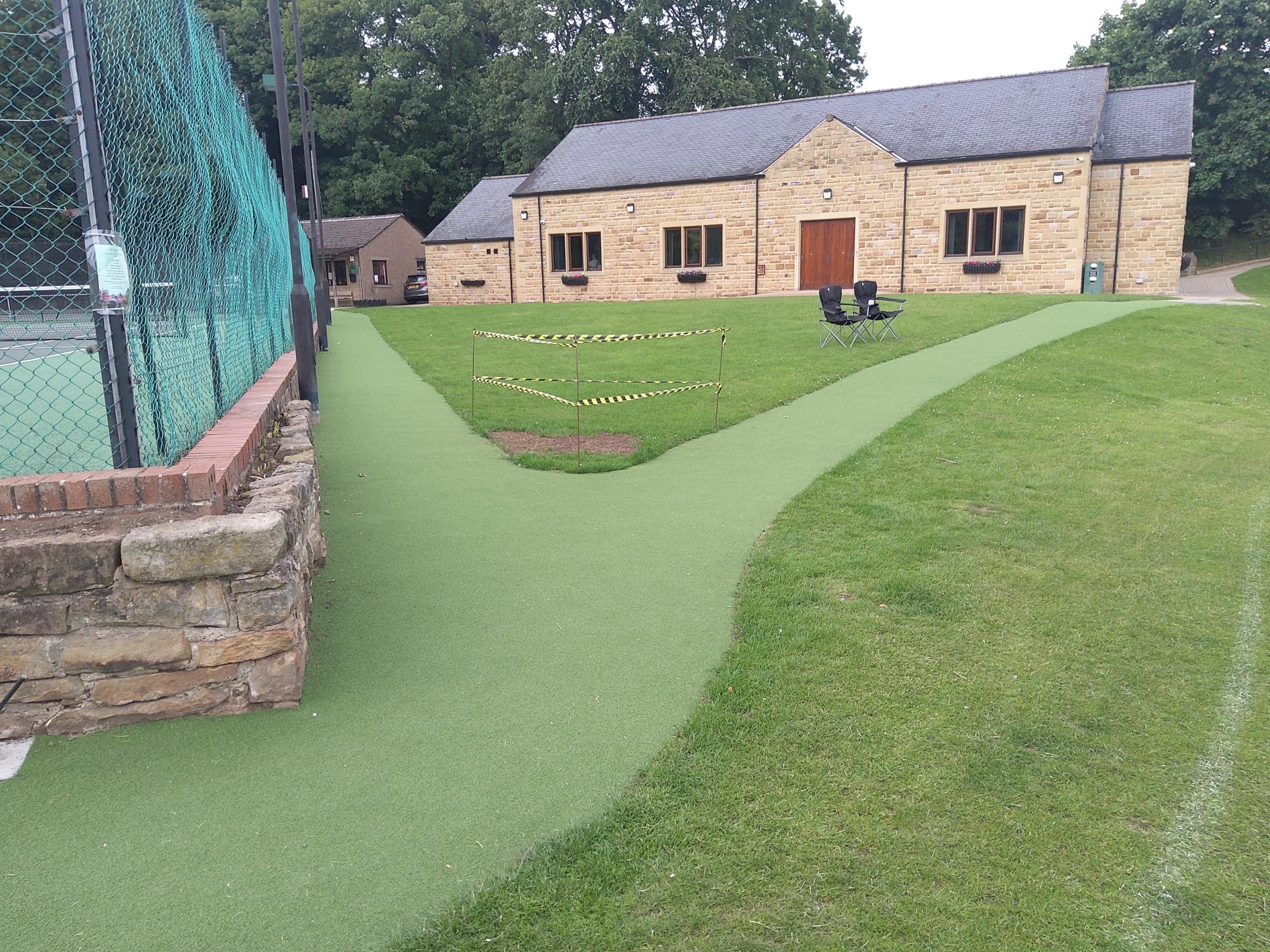 A leveled footpath between the Village Hall and Tennis Courts.